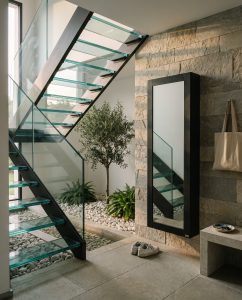 how to furnish an open under stairs space
